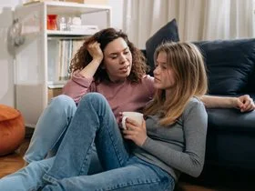 mum talking to daughter